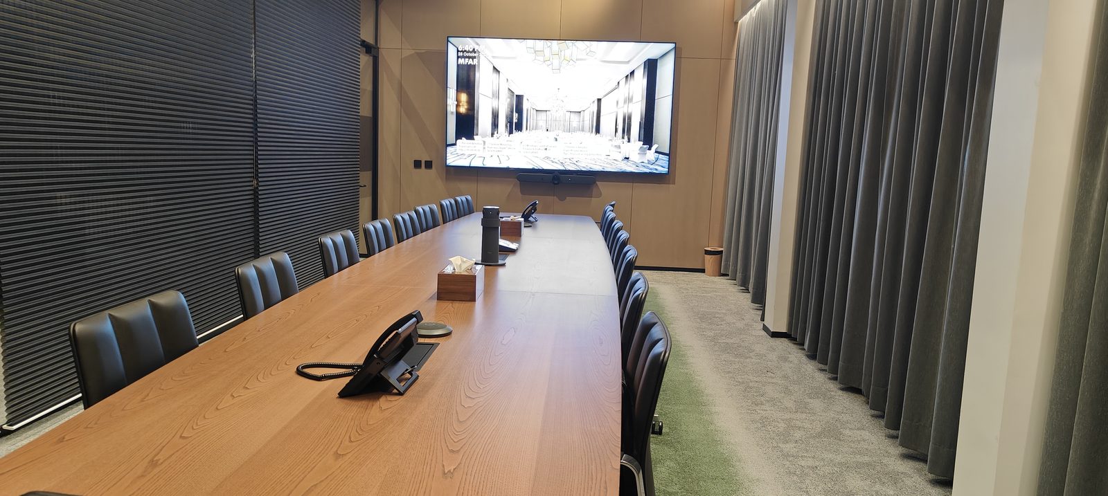 MFar Holdings 115-inch boardroom AV install