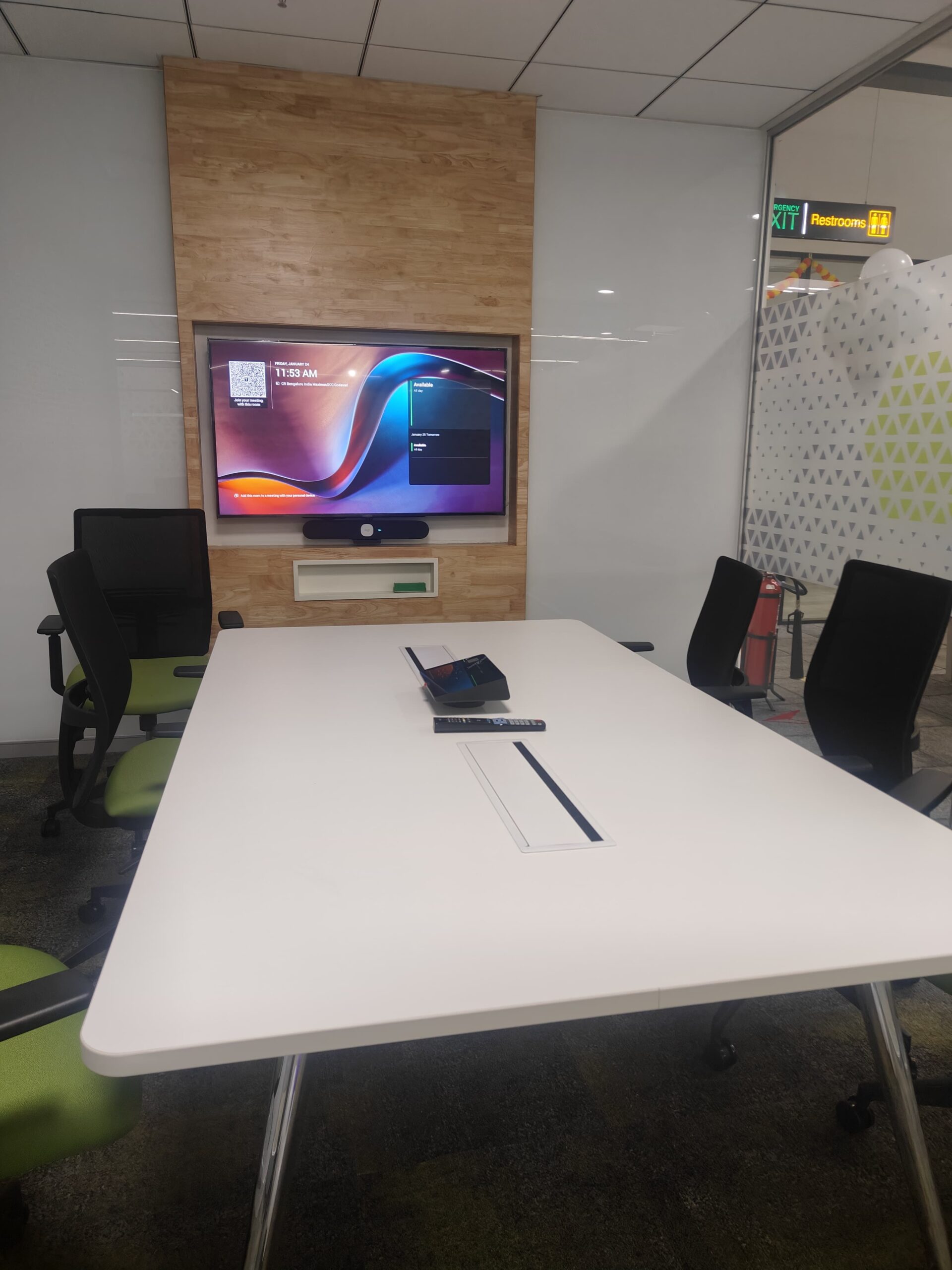 Wall-mounted Logitech Rally Bar concealed cabling